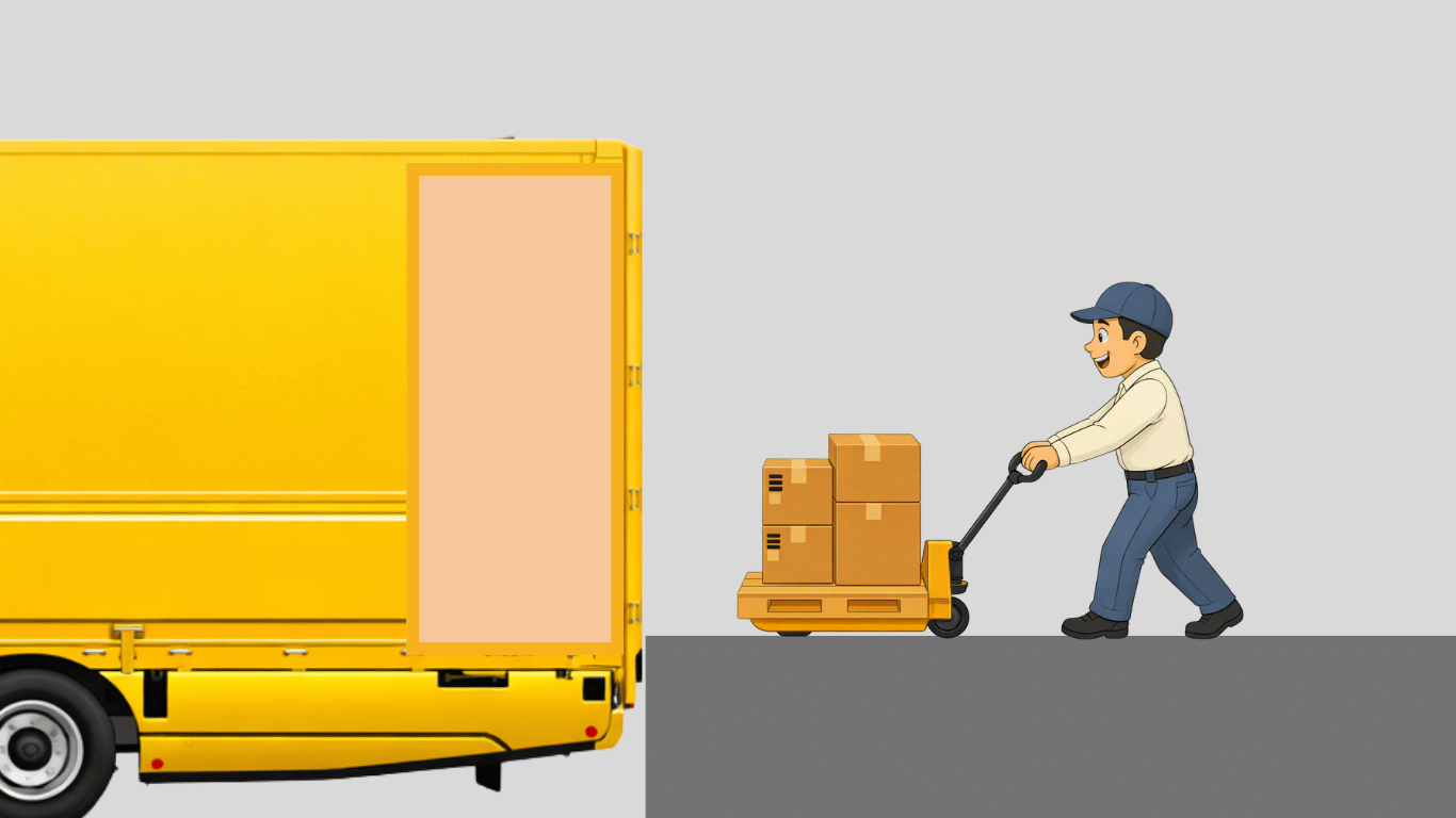 ハンドリフトを使って荷物を積み込むトラック運転手の作業風景
